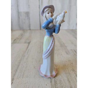 Porcelain lady bird dove figurine statue